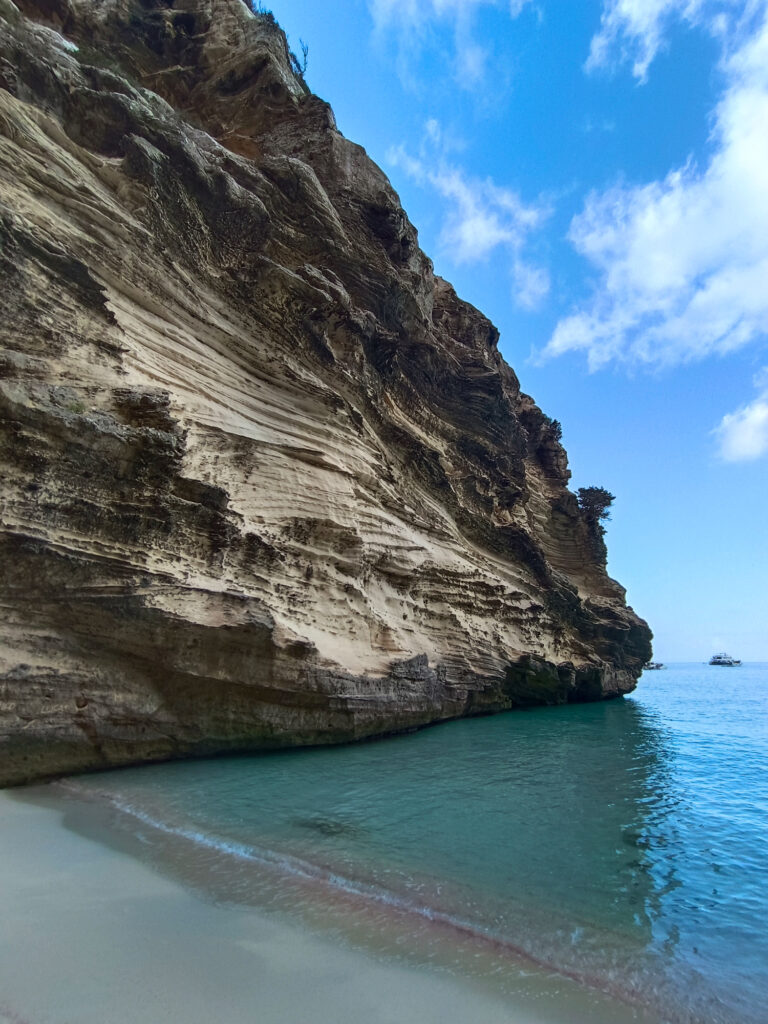 Secluded beach nestled between the sculpted cliffs, accessible only by sea, offering an exclusive slice of paradise for adventurers discovering Formentera's hidden gems